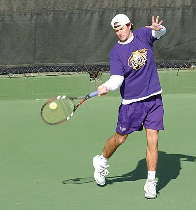 Team captain lifts tennis