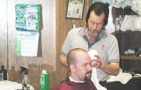 Barber shop workers follow in father's footsteps