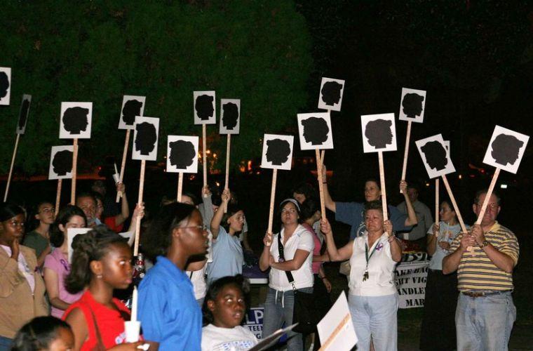 Marchers strive to end domestic violence