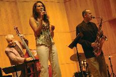 Jazz vocalist Rosana Eckert with bassist Bill Grimes and saxophonist Tony Dagradi performed in the Hot Summer Nights and Cool Jazz music series Thursday evening in the School of Music recital hall, offering a wide variety of modern jazz.