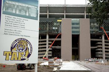 Workers continue to add the finishing touches Monday in the construction area around the new West Upper Deck addition to Tiger Stadium. Work on the project is expected to last into the beginning of football season.