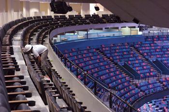 A construction worker continues with renovations in the seating are of the suites in the Superdome Thursday. The Superdome has been undergoing renovations since hurricane Katrina damaged the dome last year.