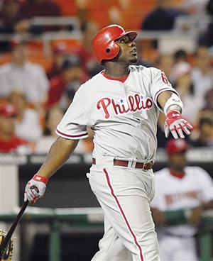 Philadelphia Phillies' Ryan Howard watches his solo home run against the Washington Nationals during the fourth inning of a baseball game, Thursday, Aug. 31, 2006, in Washington.