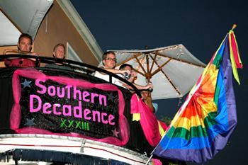 Patrons of Cafe Lafitte In Exile watch Decadence Festival activities from the club's balcony on Saturday night. Located on the corner of Bourbon Street and Dumaine Street, Cafe Lafitte in Exile is a major draw for Decadence Festival participants.