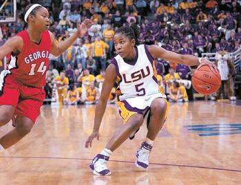 Erica White handles the ball against Georgia Feb. 12, 2006 in the PMAC. White is one of many female athletes who benefits from Title IX.