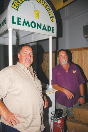 Melvin Abbott serves lemonade this past Wednesday to thirsty students in Free Speech Plaza at the LSU Union. Abbot and his twin brother Kelvin own and operate a local lemonade vending business with operations on campus.