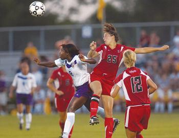 LSU sophomore midfielder Melissa Clarke heads a ball against the University of Louisiana at Lafayette on Aug. 29. The Tigers defeated the Ragin' Cajuns, 2-0.