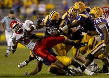 Darry Beckwith and the Tigers bring down Fresno State running back Lonyae Miller during the fourth quarter as the Tigers defeated the Bulldogs 38-6 in Tiger Stadium Saturday.