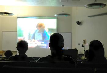 Students watch "Be Fruitful and Multiply" by Israeli filmmaker Shosh Shlam in Howe-Russell on Thursday night. The