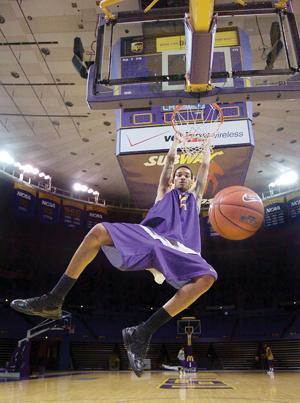 LSU sophomore Chris Johnson dunks the ball Monday after practice in the PMAC. Johnson has increased his playing time, averaging almost 10 points a contest in his last four games.