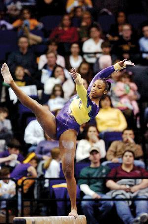 Former LSU gymnast Ashleigh Clare-Kearney performs on the balance beam in the Peter Maravich Assembly Center during the Tigers' loss to the University of Georgia in 2007.