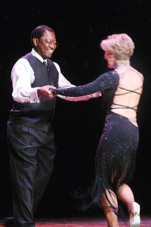 Baton Rouge Mayor Kip Holden dances with Lane Barry, of Bill Anderson Dance school, at Big Buddy's first annual Dancing with the Stars in the Assembly Center Saturday evening. The event served as a fund raiser for the mentoring organization.