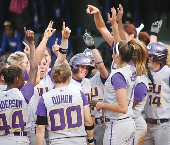 The Tigers celebrate senior center fieder Leslie Klein's home run Tuesday in the second inning in an 11-1 win against Southern University at Tiger Park. LSU broke the school record for home runs in an inning with three in the first inning.