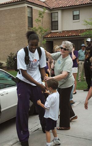 Darlene Foster(right) and Sammy Smiley wish Sylvia Fowles good luck in the Final Four as she loads the team bus on Thursday afternoon. The LSU Women's Basketball Team will be facing Rutgers University in the Final Four for an oppurtunity to play in the championship game.