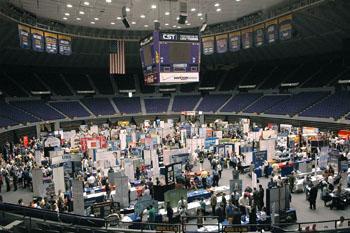 Crowds of students gather at booths set up by recruiters at the Career Expo held in the PMAC on Thursday. This years Career Expo was the largest ever and featured representatives from about 285 separate career choices.