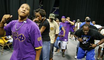 Members of Omega Psi Phi and Phi Beta Sigma perform step dances through the aisles of the Pete Maravich Assembly Center between performances at Harambee on Thursday night. Harambee is an annual celebration of unity at the University.