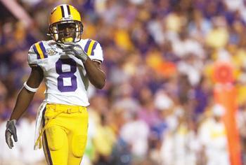 LSU sophomore return specialist Trindon Holliday awaits the Florida kickoff during the Tigers, 28-24 win. Baseball, football and track and field coaches combine efforts to recruit dual-sport athletes such as Holliday.