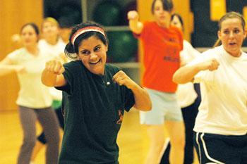 Elyse Marks, architecture junior, attends a cardio kickboxing class at the UREC.