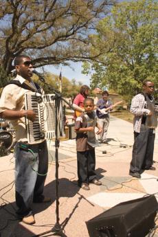 Students watch as Lil Nathan &amp; the Zydeco Big Timers perform Monday in Free Speech Alley. The performance was a part of "Louisiana Week" sponsored by SG.