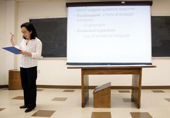 Felicia Song, mass communication professor, teaches class Monday in Lockett Hall. Song said she is more concerned about other professors using her lecture material than students sharing notes among each other.