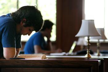 David Reynolds, history junior, studies at Hill Memorial Library on Monday. Hill Memorial houses thousands of historical documents, which attract visitors from across the nation.