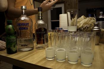 Students make Kamikazes, which contain vodka, Triple Sec and lime juice at a recent party. A Harvard study shows students who did not drink in high school are less likely to binge drink in college.