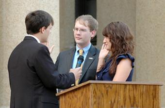 SG President Colorado Robertson (middle) and Vice President Shannon Bates (right) are sworn into office Friday afternoon in front of Memorial Tower.