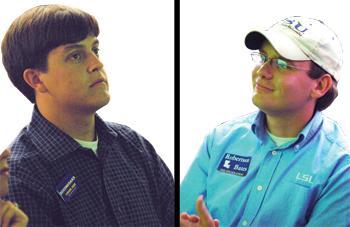 Student Government presidential candidates Dixon McMakin and Colorado Robertson listen Thursday to the results of the spring SG elections. McMakin and Robertson will meet in a run-off election next week.