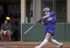 Erika Sluss hits the first home run of a 10-2 victory Wednesday against Nicholls State in Tiger Park.