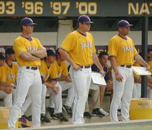 [From right to left] Former LSU hitting coach Cliff Godwin, pitcher Nolan Cain and former associate head coach Terry Rooney stand in the dug out during one of the Tigers' Regional games in Baton Rouge.