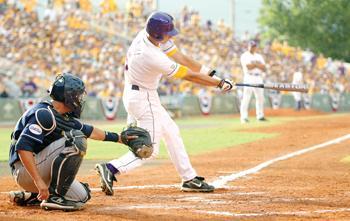 LSU junior right fielder Derek Helenihi (right) swings at a pitch during the Tiger's game against UC Irvine. The Tigers were unable to capitalize on rallies during the game against UC Irvine and lost 11-5.