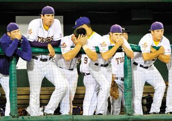 LSU players react after losing 7-3 to North Carolina on Friday in the NCAA College World Series elimination baseball game, in Omaha, Neb. Although the loss ended the Tigers' season, coach Paul Mainieri and the players expressed gratitude.