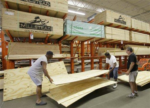 Shoppers load up on plywood at a Home Depot store as the Gulf Coast prepares for Hurricane Gustav, Sunday, Aug. 31, 2008, in Lafayette, La.