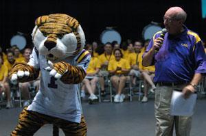 Michael Martin, new University chancellor, and Mike the Tiger welcome the class of 2012 Sunday night in the PMAC.