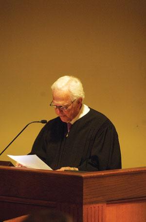 Louisiana Supreme Court Chief Justice Pascal Calogero, Jr. participates in a play entitled &#8220;Father