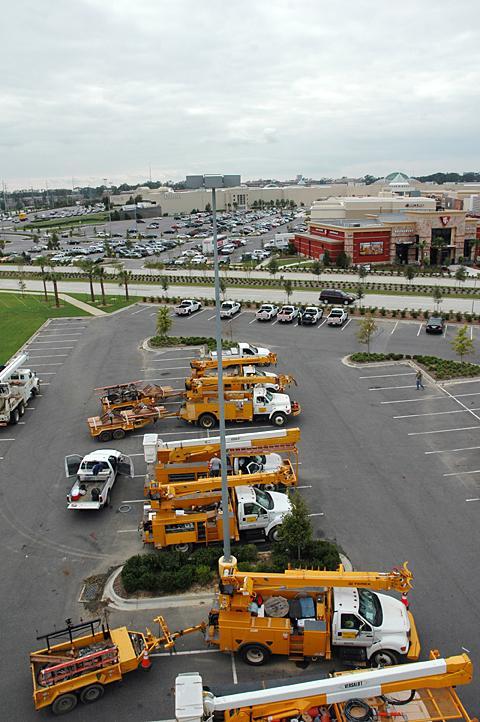 Powerline repair crews are staged at a local movie theater parking lot. Hurricane Gustav caused extensive damage to the University's campus and Baton Rouge.