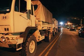 Army trucks roll into the University early Monday morning to deliver supplies to the PMAC, Huey Long Field House and the AgCenter. Army soldiers will be station at the University until further notice.