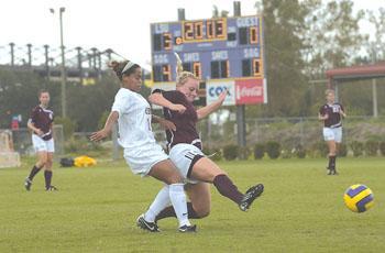 Junior Defender, Nikki&#160;Bush, passes just before the ball is stolen.