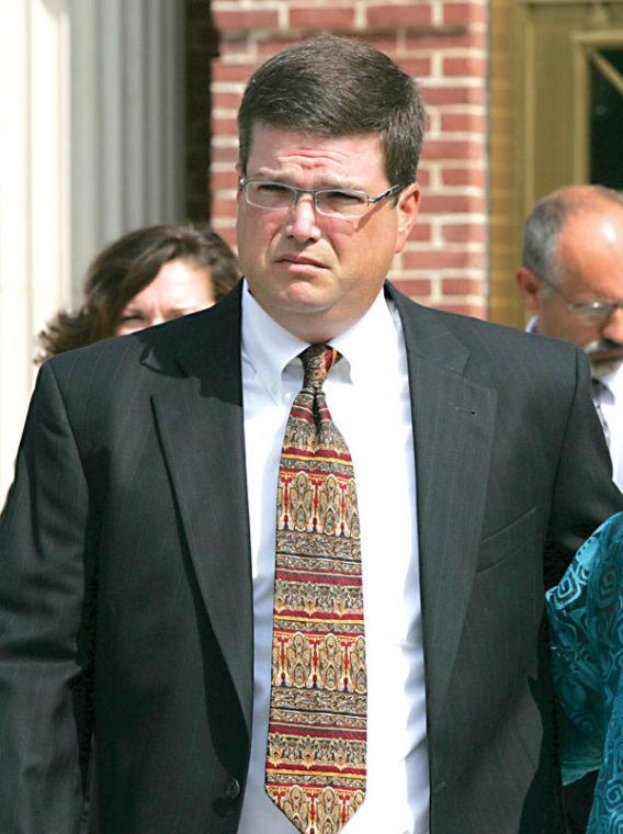 South Carolina Trooper, Steven C. Garren, leaves Federal Court in Columbia, S.C. on July 25.