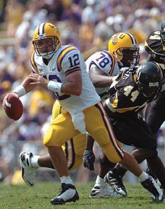 LSU redshirt freshman quarterback Jarrett Lee scrambles Aug. 30 during LSU's 41-13 win agianst Appalachian State. Lee's stats in his first start match up well with past LSU quarterbacks.