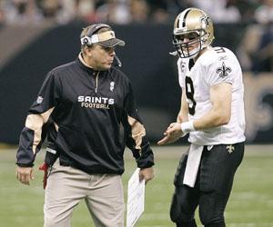 New Orlens Saints coach Sean Payton talks with quarterback Drew Brees during the Oct. 6 game against the Minnesota Vikings in New Orleans.