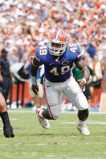 Defensive end Jermaine Cunningham rushes Hawaii quarterback Greg Alexander. He is a former high school teammate of LSU&#8217;s Perry Riley and Kelvin Sheppard.