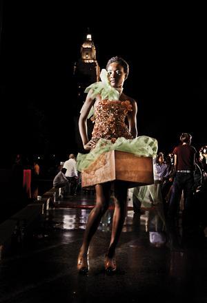 A model shows off her piece Saturday at the second annual wearable art show.