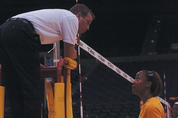 Senior outside hitter Kyna Washington talks with an official during Sunday&#8217;s game against Kentucky at the Pete Maravich Assembly Center.