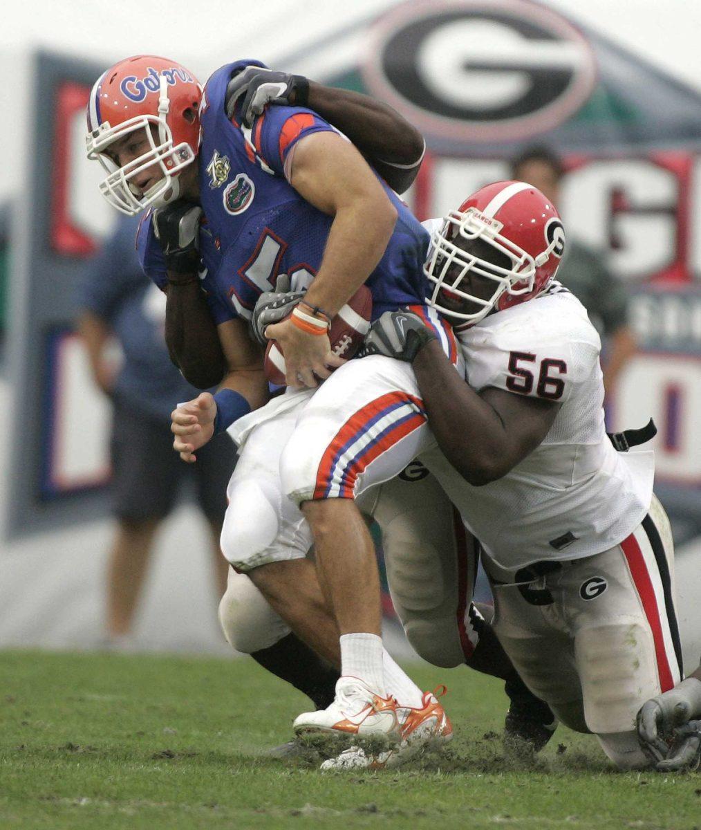 Florida quarterback Tim Tebow, left, is sacked by Georgia&#8217;s Geno Atkins on Oct. 27, 2007, during Georgia&#8217;s 42-30 win in Jacksonville, Fla.