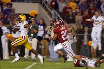 Wide receiver Demetrius Byrd breaks away from Alabama defensive back Marcus Carter to run the ball in for a touchdown during LSU&#8217;s 41-34 victory in Bryant-Denny Stadium last season.