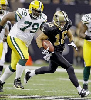 New Orleans wide receiver Lance Moore (16) breaks away from Green Bay defender Ryan Pickett (79) and scores a touchdown in the Saints&#8217; 51-29 win Monday night against the Packers. The win improved the Saints&#8217; record to 6-5 this season.