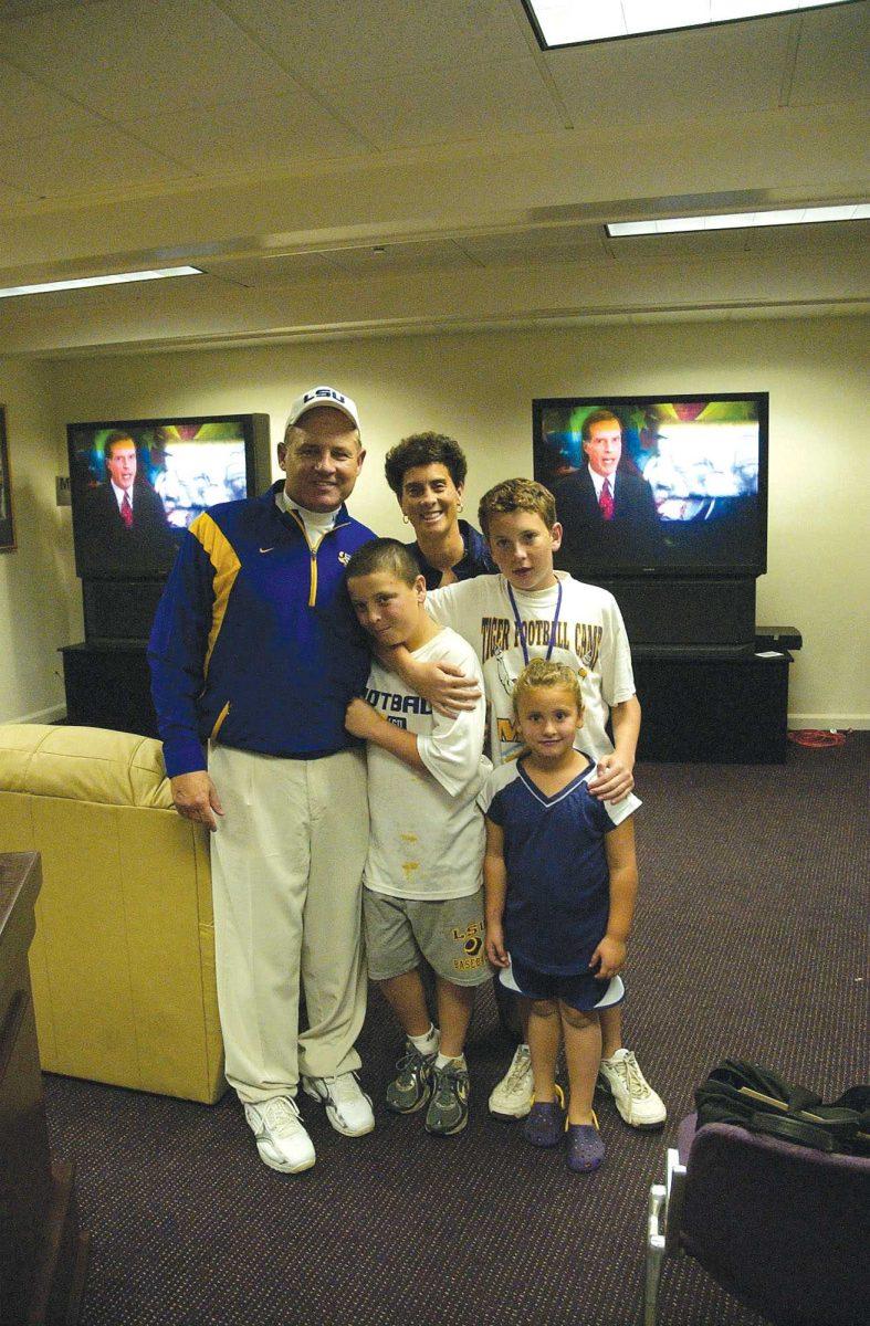 [From tallest to shortest] Les, Kathy, Manny, Ben and Macy Grace Miles meet after the Tulane game.