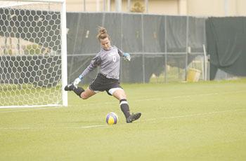 Freshman goalkeeper Mo Isom launches a goal kick during the Tigers&#8217; 7-0 victory against Centenary on Sept. 14.