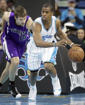 New Orleans Hornets guard Chris Paul (3) starts a fast break in the first half of the Hornets&#8217; 105-96 loss in New Orleans on Wednesday night.